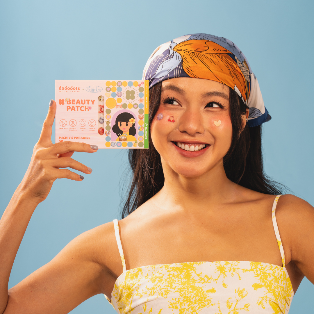 Model holding a Dododots beauty patch pack
