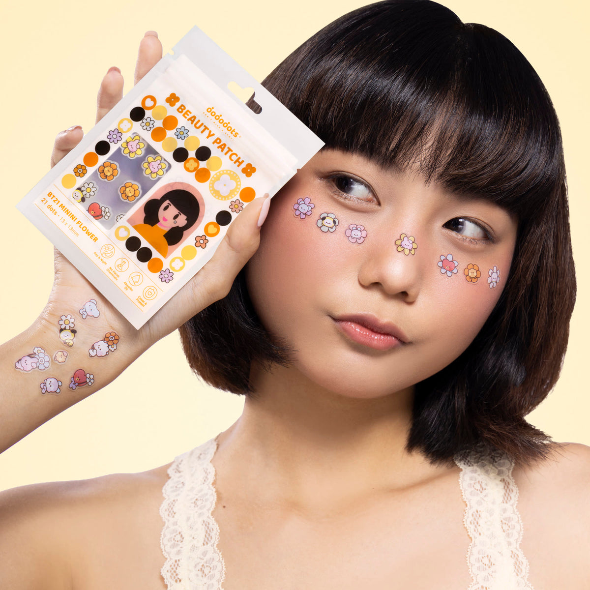 Model wearing Dododots BT21 Minini Flower pimple patches